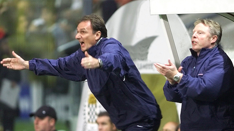 A man talking into a microphone